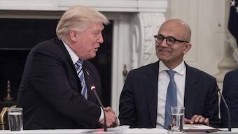 File photo of Donald Trump shaking hands with Microsoft CEO Satya Nadella during an American Technology Council roundtable at the White House in Washington on June 19, 2017. Source: AFP.