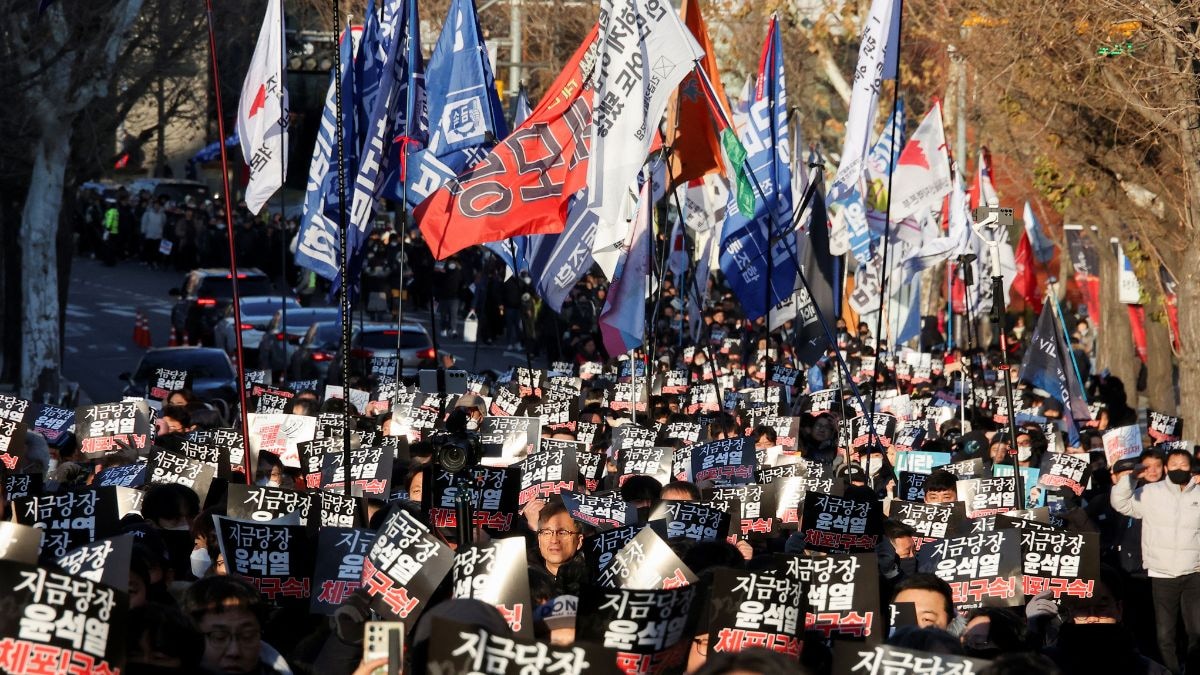 South Korea's political leadership in crisis as president refuses arrest