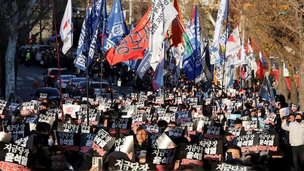 South Korea's political leadership in crisis as president refuses arrest