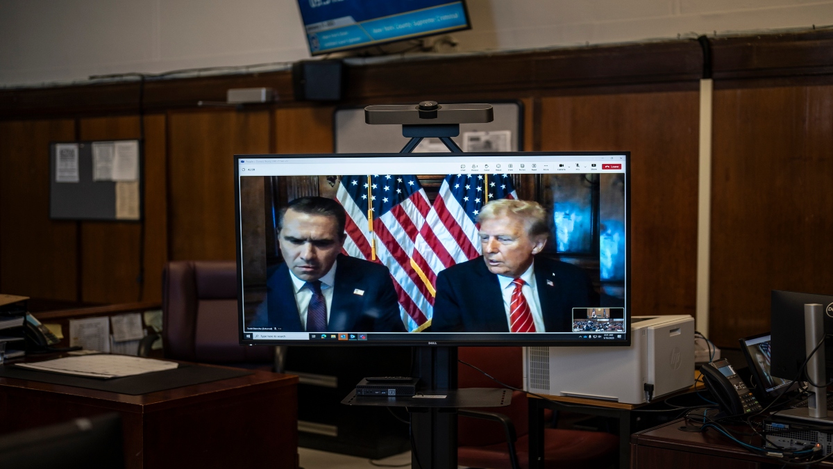Attorney Todd Blanche and President-elect Donald Trump, seen on a television screen, appear virtually for sentencing for Trump's hush money conviction in a Manhattan courtroom on Friday in New York. AP Attorney Todd Blanche and President-elect Donald Trump, seen on a television screen, appear virtually for sentencing for Trump's hush money conviction in a Manhattan courtroom on Friday in New York. AP