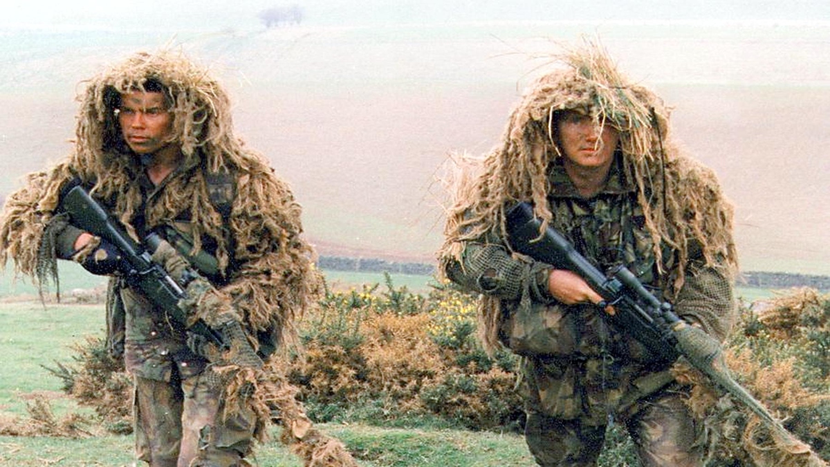 Picture dated 1997 shows British snipers in full camouflage on a patrol in an undisclosed location. AFP File Picture dated 1997 shows British snipers in full camouflage on a patrol in an undisclosed location. AFP File