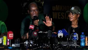 FILE -Former South African President Jacob Zuma, speaks as his daughter Duduzile Zuma-Sambudla, right, listens, during a press conference in Soweto, South Africa, Dec. 16, 2023. AP