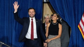 JD Vance and his wife Usha Vance appear on stage during his rally in Scottsdale, Arizona. Reuters/File Photo
