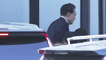 Impeached South Korean President Yoon Suk Yeol arrives at the Corruption Investigation Office for High-ranking Officials in Gwacheon, South Korea. AP
