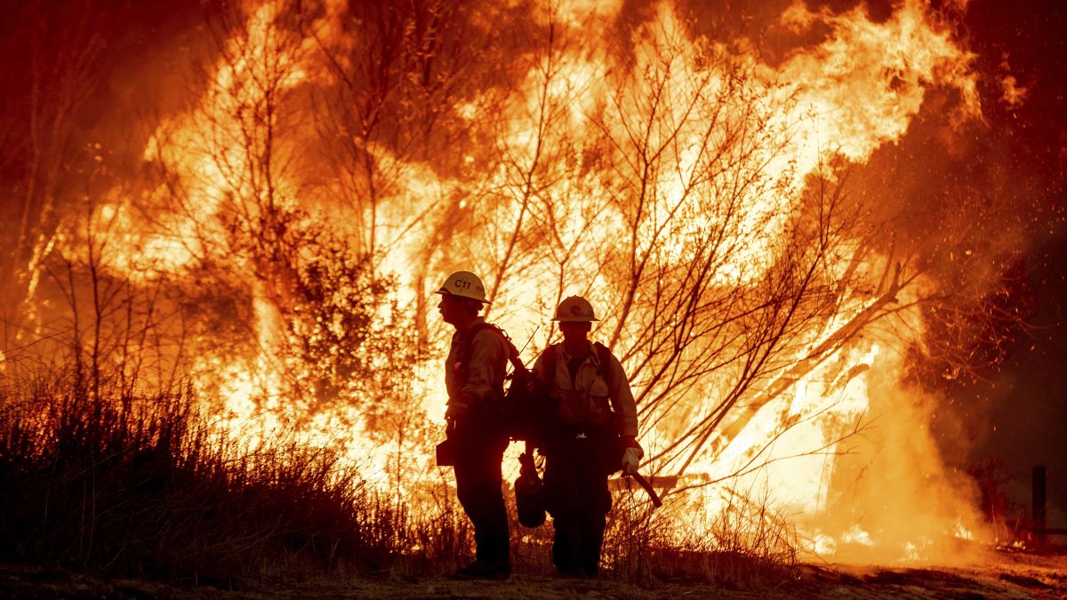Fire crews battle the Kenneth Fire in the West Hills section of Los Angeles, Thursday, on January 9. AP Fire crews battle the Kenneth Fire in the West Hills section of Los Angeles, Thursday, on January 9. AP