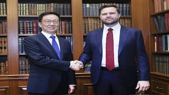 Chinese Vice President Han Zheng, as Chinese President Xi Jinping's special representative (left) meets with US Vice President-elect JD Vance in Washington. Xinhua/AP