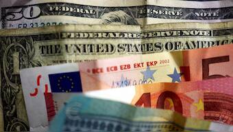 US dollar and Euro bank notes photographed in Frankfurt, Germany, in this illustration picture taken May 7, 2017. Source: Reuters. 