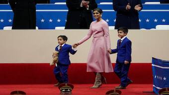Usha Vance, wife of Vice President JD Vance, takes the stage with her sons during the inauguration parade for President Donald Trump at Capital One Arena in Washington. Reuters