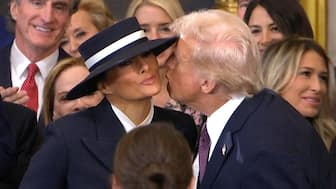 Trump and Melania’s awkward kiss-miss moment