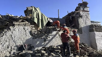 Rescue workers search for survivors in the aftermath of an earthquake in Changsuo Township of Dingri in Xigaze, southwestern China's Tibet Autonomous Region. AP