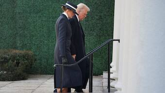 US President-elect Donald Trump and his wife Melania Trump arrive for a service at St. John's Church on Inauguration Day. Reuters