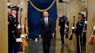 Former President Barack Obama arrives ahead of Donald Trump's inauguration. Michelle's absence was glaring at the event as Barack made his entrance. Reuters