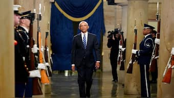 Former President Barack Obama arrives ahead of Donald Trump's inauguration. Michelle's absence was glaring at the event as Barack made his entrance. Reuters