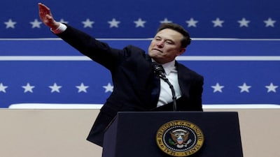 Elon Musk gestures at the podium inside the Capital One arena on the inauguration day of Donald Trump's second presidential term, in Washington. Many likened his hand gesture to a Nazi salute. Reuters