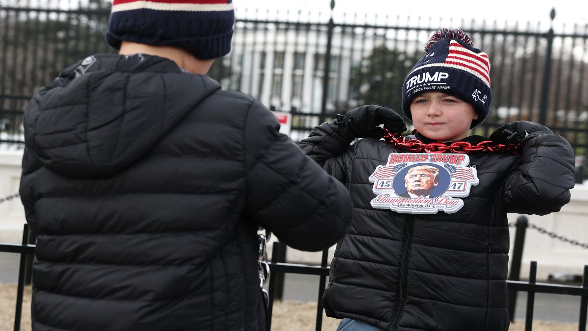 Young children with Trump paraphernalia stand outside the White House in Washington, DC. U.S. President-elect Donald Trump will be sworn in on January 20 and amidst his swearing-in, frantic efforts will be made to move in his things at the White House. AFP Young children with Trump paraphernalia stand outside the White House in Washington, DC. U.S. President-elect Donald Trump will be sworn in on January 20 and amidst his swearing-in, frantic efforts will be made to move in his things at the White House. AFP