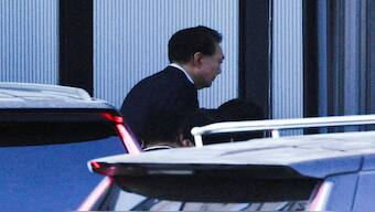 South Korea's impeached President Yoon Suk Yeol arrives at the Corruption Investigation Office (CIO), in Gwacheon, South Korea after he was arrested from his presidential compound. Reuters