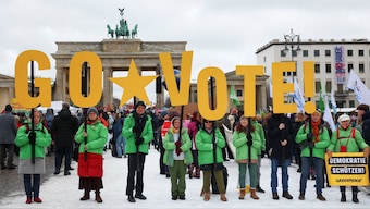 Activists encourage people to go and vote in the elections during a Fridays for Future climate strike. File image/Reuters