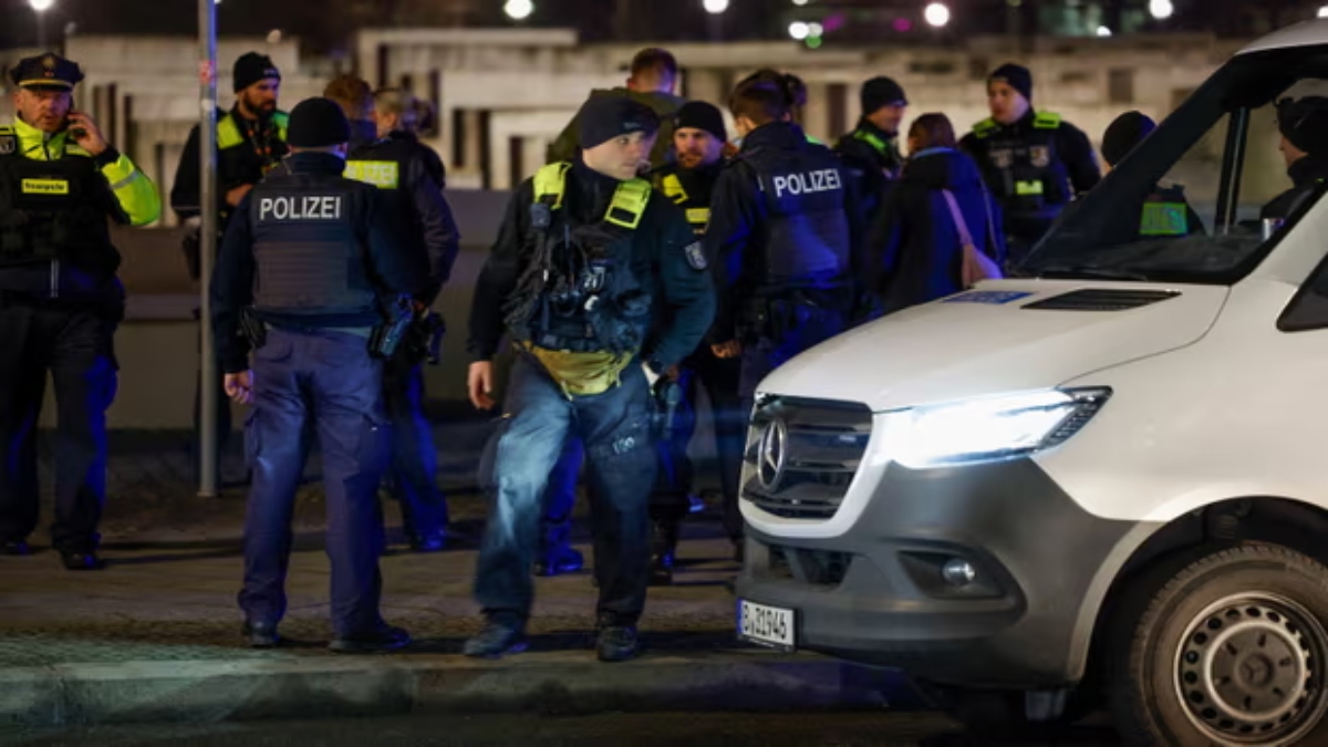 Police officers at the scene of a stabbing in Berlin, Germany on 21 February. AFP Police officers at the scene of a stabbing in Berlin, Germany on 21 February. AFP