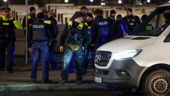 Police officers at the scene of a stabbing in Berlin, Germany on 21 February. AFP