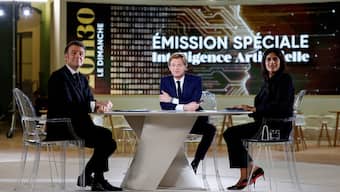 French President Emmanuel Macron with French journalist Laurent Delahousse and Firstpost managing editor Palki Sharma ahead of the Artificial Intelligence Action Summit at the Grand Palais in Paris. AP