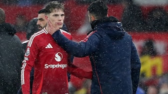 Manchester United's Alejandro Garnacho with Ruben Amorim as he is substituted off. Image: Reuters