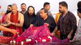 Mukesh Ambani, along with his mother, sons, and grand children, took the Holy Dip at Triveni Sangam during Maha Kumbh at Prayagraj. Image Courtesy: Firstpost 