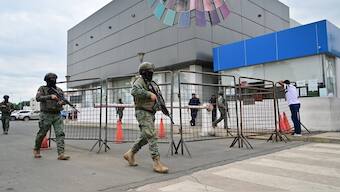 Members of the Armed Forces guard the morgue of Guayaquil, Ecuador. AFP