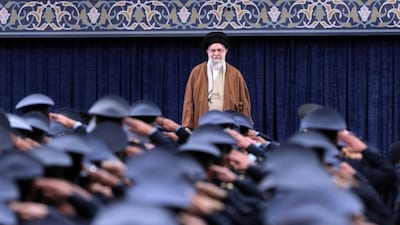 Iranian Supreme Leader Ayatollah Khamenei listens to the national anthem as air force officers salute during their meeting in Tehran, Iran, Friday, February 7, 2025. AP File