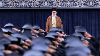 Iranian Supreme Leader Ayatollah Khamenei listens to the national anthem as air force officers salute during their meeting in Tehran, Iran, Friday, Feb. 7, 2025. (Photo: AP)