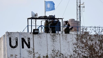 Members of the United Nations peacekeepers (UNIFIL) look at the Lebanese-Israeli border, as they stand on the roof of a watch tower ‏in the town of Marwahin, in southern Lebanon, October 12, 2023. (Photo: Reuters)