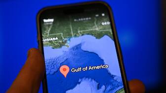 This photo illustration shows the "Gulf of America" displayed on the Google Earth application on a smartphone in Washington, DC. AFP