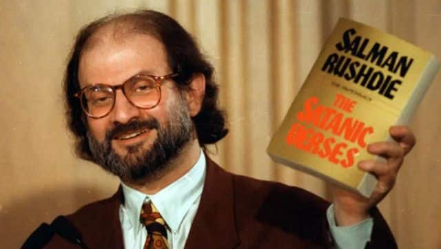 Author Salman Rushdie holds up a copy of his controversial book “The Satanic Verses” during a 1992 news conference in Arlington, Virginia. File image/AP