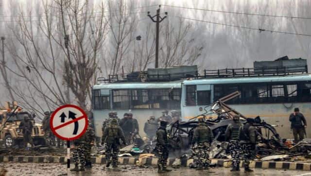 Security personnel carry out the rescue and relief works at the site of suicide bomb attack at Lathepora Awantipora in Pulwama district of south Kashmir on February 14, 2019. File image/PTI