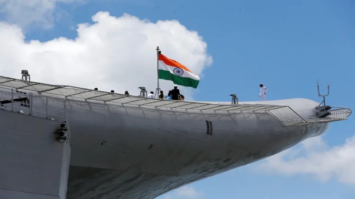 Indian navy officers stand on the flight deck of India's first home-built aircraft carrier, the INS Vikrant, after its commissioning ceremony at a state-run shipyard in Kochi, India, on September 2, 2022. Reuters File Indian navy officers stand on the flight deck of India's first home-built aircraft carrier, the INS Vikrant, after its commissioning ceremony at a state-run shipyard in Kochi, India, on September 2, 2022. Reuters File