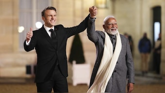 Indian Prime Minister Narendra Modi, right, is greeted by President of France Emmanuel Macron as he arrives for a reception at Palais de l'Elysee in Paris. AP