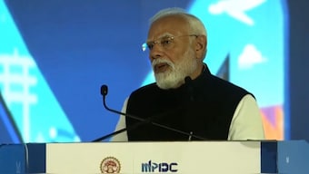 Prime Minister Narendra Modi addressing the Global Investors Summit in Madhya Pradesh. Image courtesy: Screengrab from X.com/@narendramodi