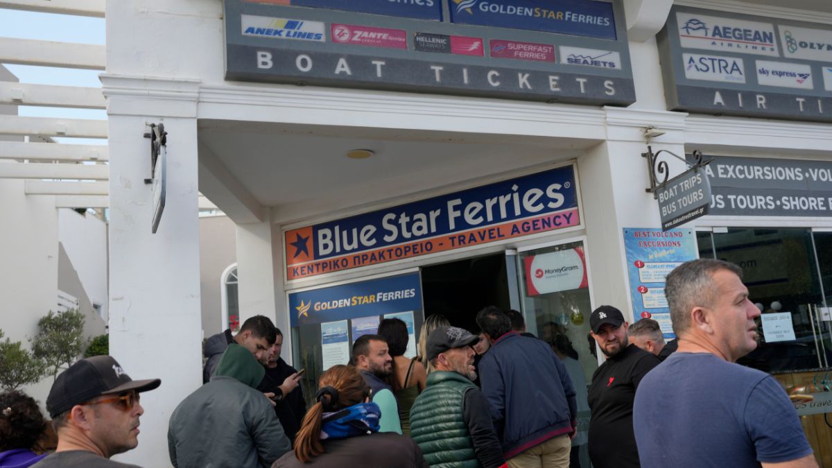 People wait to buy boat and air tickets as Greek authorities are taking emergency measures in response to intense seismic activity on the popular Aegean Sea holiday island of Santorini, southern Greece, Monday, Feb. 3, 2025. Image- AP People wait to buy boat and air tickets as Greek authorities are taking emergency measures in response to intense seismic activity on the popular Aegean Sea holiday island of Santorini, southern Greece, Monday, Feb. 3, 2025. Image- AP