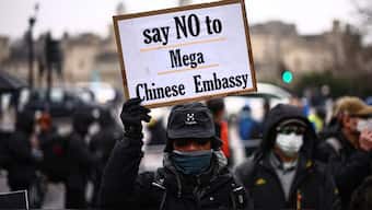 Protesters gather at the site of the former Royal Mint in London on February 8, 2025, to demonstrate against a proposal to move China's embassy to this site, a stones-throw from The Tower of London.  Image- AFP