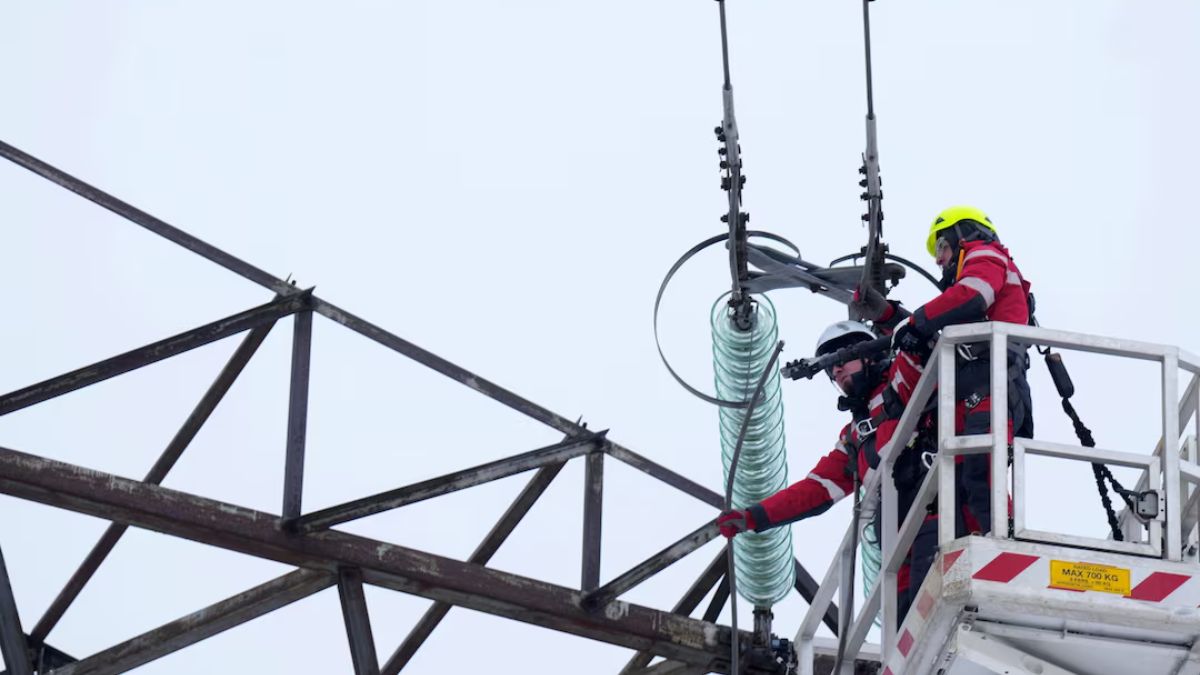 Specialists of the Latvian independent power transmission system operator cut a loop of power line from Russia after decoupling from their power grid, near Vilaka, Latvia February 8, 2025. Image- Reuters Specialists of the Latvian independent power transmission system operator cut a loop of power line from Russia after decoupling from their power grid, near Vilaka, Latvia February 8, 2025. Image- Reuters