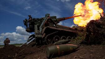 Ukrainian soldiers of the 43rd Artillery Brigade fire a howitzer toward Russian positions at the front line in the Donetsk region of eastern Ukraine. File Image- AP