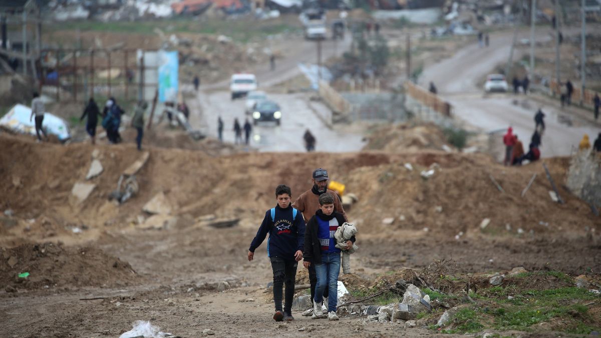 Civilians walk in al-Mughraqa in the central Gaza Strip, on February 13, 2025, as displaced people move towards the northern parts of Gaza during a current ceasefire deal in the war between Israel and Hamas. Image- AFP Civilians walk in al-Mughraqa in the central Gaza Strip, on February 13, 2025, as displaced people move towards the northern parts of Gaza during a current ceasefire deal in the war between Israel and Hamas. Image- AFP