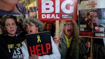 Relatives and supporters of Israelis held hostage in Gaza since the October 7, 2023 attacks hold a demonstration calling on the US to intervene for their release in front of the US embassy branch office in Tel Aviv, on February 4, 2025. File Image- AFP