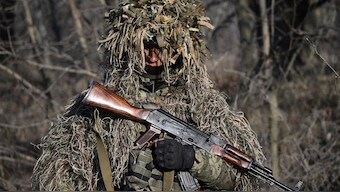 A serviceman of the Alkatraz special rifle battalion, former prisoner who volunteered to defend Ukraine, of the 93rd Motorized Brigade takes part in a military drill in an undisclosed location in the Donetsk region on February 13, 2025, amid the Russian invasion of Ukraine.  File Image- AFP