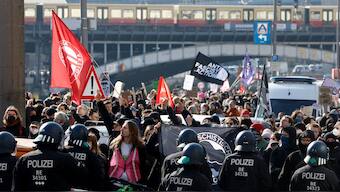 Counter-marchers protest against a march of extreme right supporters, on February 22, 2025 in Berlin, one day before general elections. Image- AFP