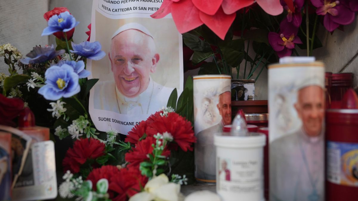 Candles and a photo of Pope Francis are seen in front of the Agostino Gemelli Polyclinic, in Rome, Saturday, Feb. 22, 2025, where the Pontiff is hospitalized since Friday, Feb. 14. Image- AP Candles and a photo of Pope Francis are seen in front of the Agostino Gemelli Polyclinic, in Rome, Saturday, Feb. 22, 2025, where the Pontiff is hospitalized since Friday, Feb. 14. Image- AP