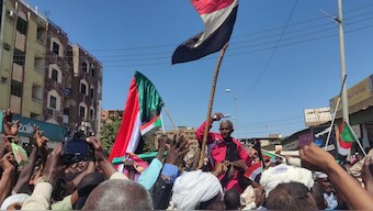 Sudanese attend a protest in support of the army in the eastern city of Gedaref on February 22, 2025. Since April 2023, Sudan has been engulfed in a war between the forces of army chief Abdel Fattah al-Burhan and his former deputy Mohammed Hamdan Daglo, who commands the RSF. - AFP