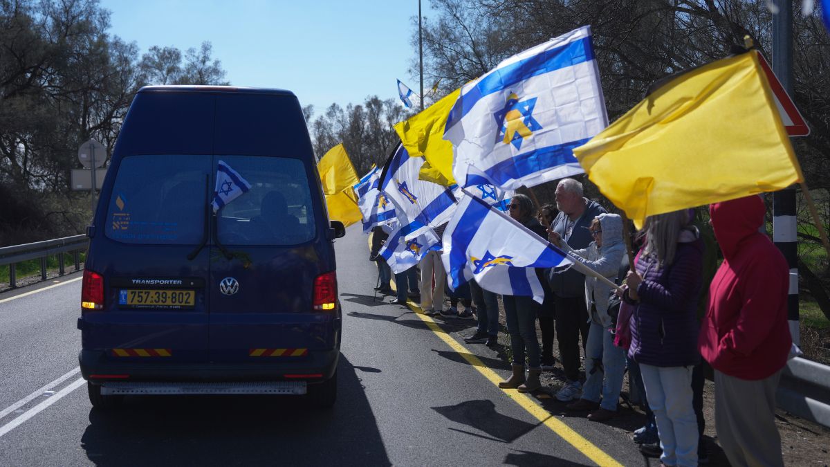 Israeli mourners bid farewell to Oded Lifshitz, a hostage abducted by Hamas in 2023, as his coffin arrives at Kibbutz Nir Oz for burial on February 25, 2025. Image-AP. Israeli mourners bid farewell to Oded Lifshitz, a hostage abducted by Hamas in 2023, as his coffin arrives at Kibbutz Nir Oz for burial on February 25, 2025. Image-AP.