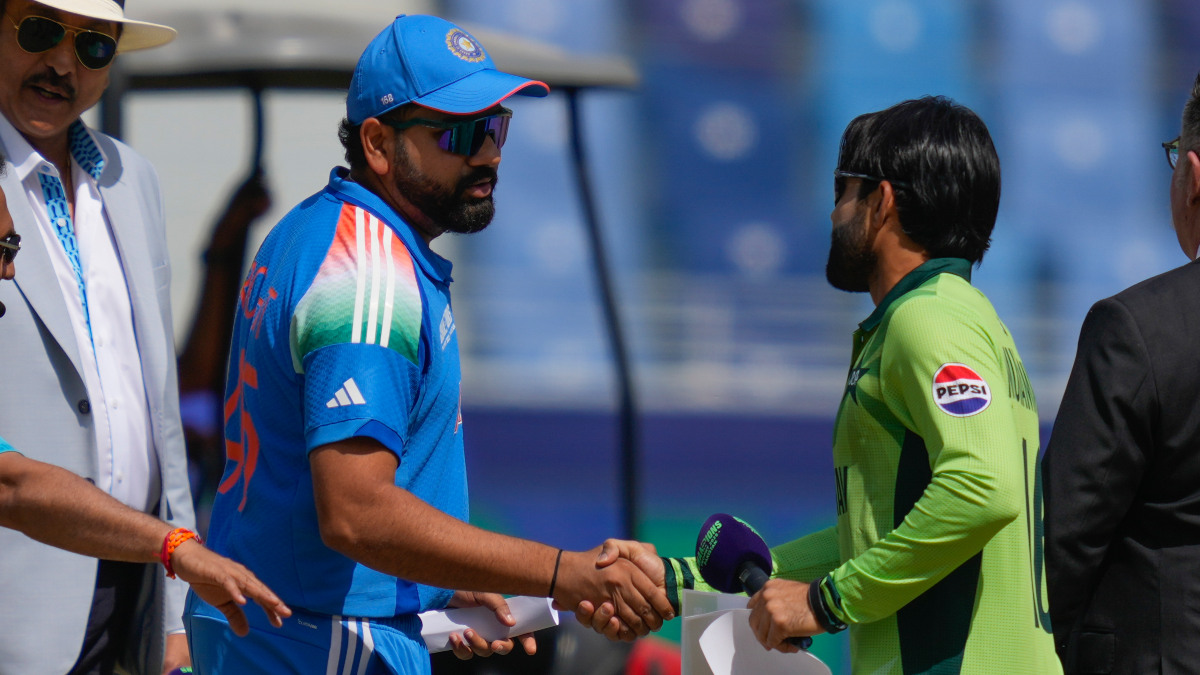 India captain Rohit Sharma shakes his Pakistani counterpart Mohammad Rizwan's hand during the toss in the ICC Champions Trophy Group A match between the two arch-rivals in Dubai. AP India captain Rohit Sharma shakes his Pakistani counterpart Mohammad Rizwan's hand during the toss in the ICC Champions Trophy Group A match between the two arch-rivals in Dubai. AP