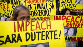Activists carry banners calling for the impeachment of Philippine Vice President Sara Duterte at a rally outside the House of Representatives in Quezon City, Metro Manila, Philippines, February 5, 2025. File Image/Reuters