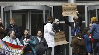 People celebrate outside a Seattle federal courthouse after a second federal judge paused President Donald Trump's order against gender-affirming care for youth in Seattle. AP